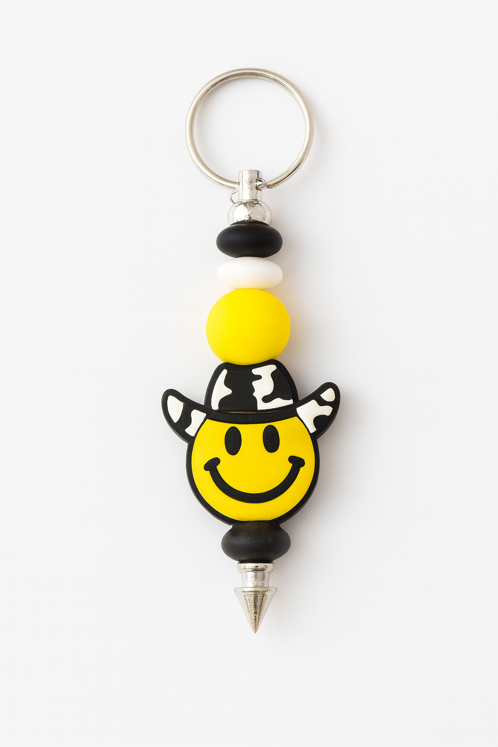 Yellow smiley face cowboy charm keychain with black and white silicone beads